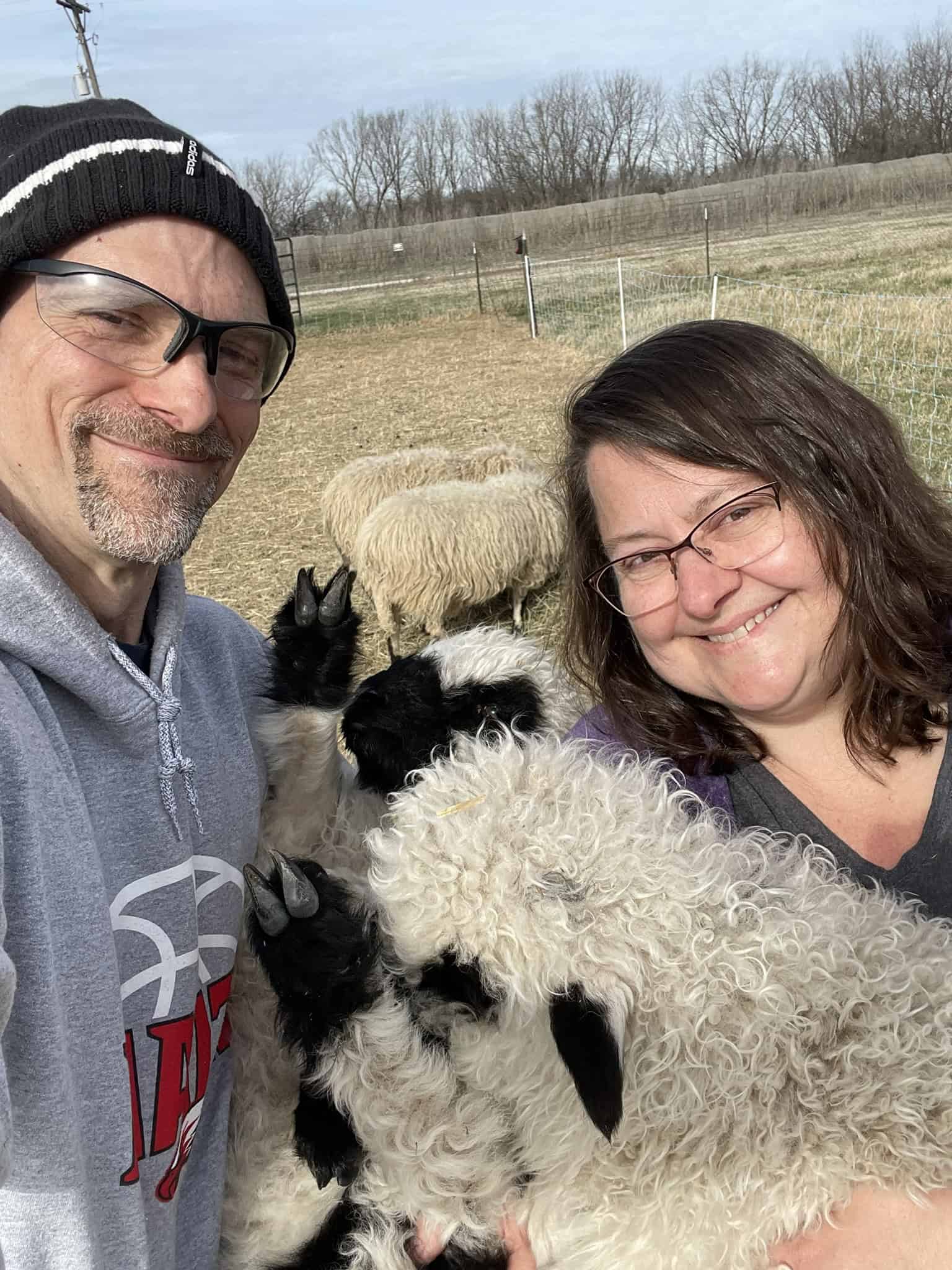 Kiersten_Greg_Harrod_Holding_Lambs